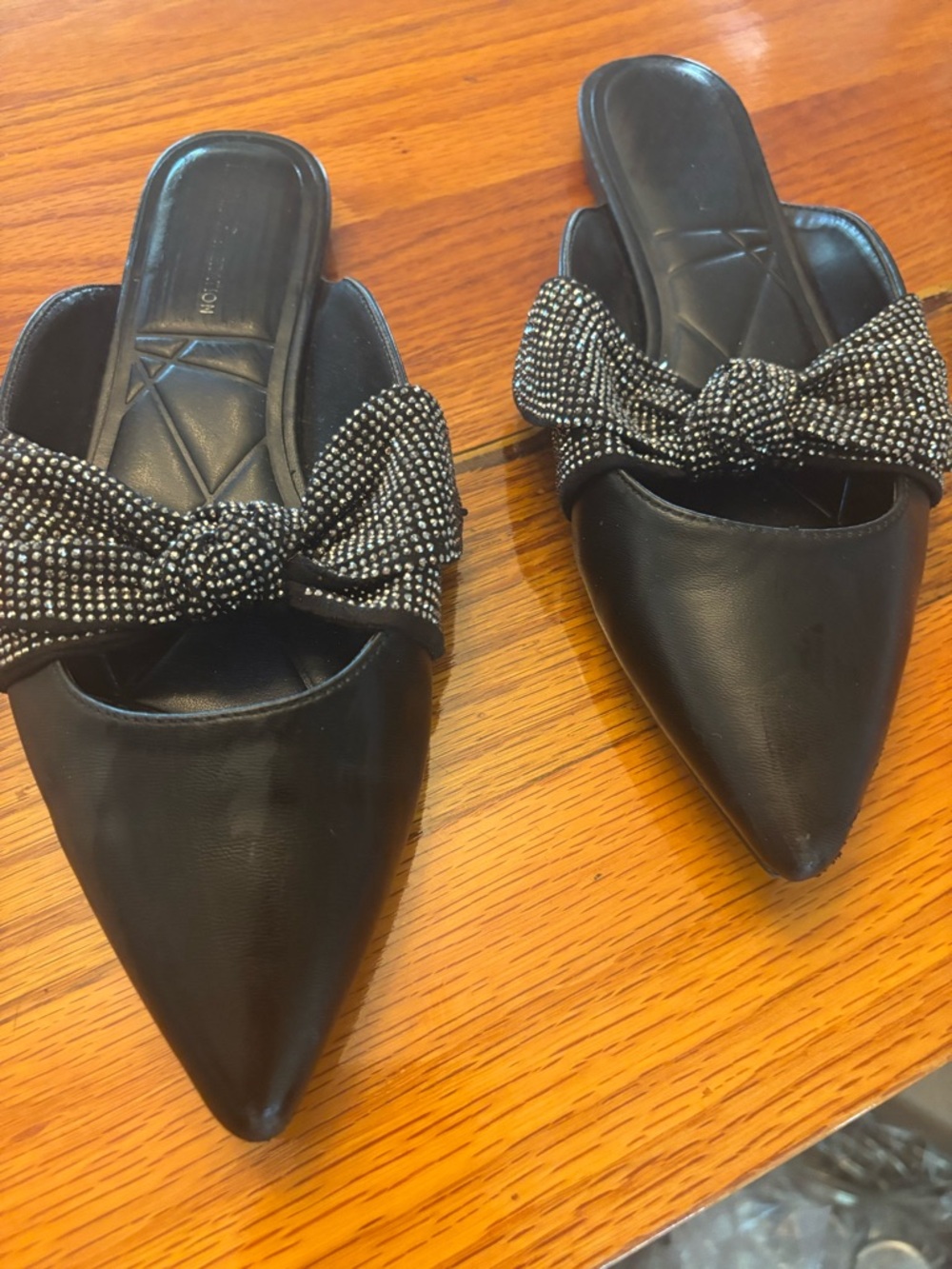 BCBGeneration Black Pointed Slip-On Mules with Beaded Bow